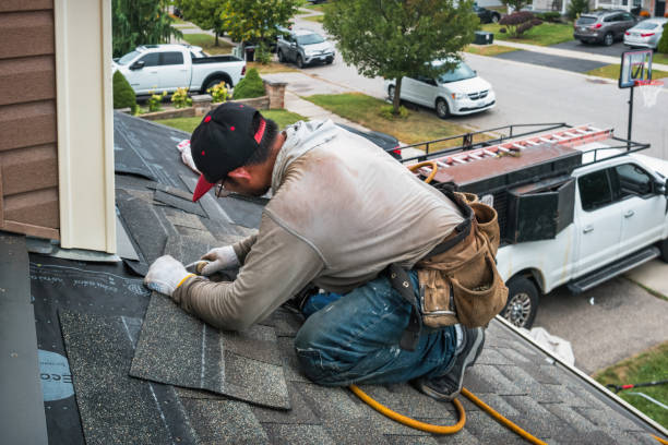 Professional Gutter Repair And Installation technician working in Mitchell, IN